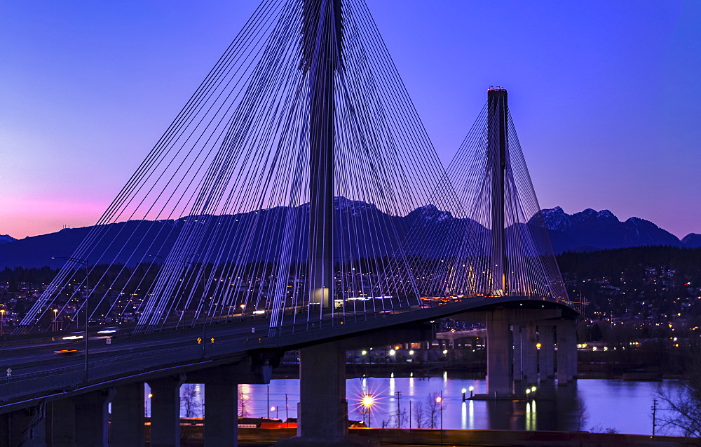 Port Mann Bridge at dusk, viewed from Surrey looking into Coquitlam, Surrey, British Columbia, Canada