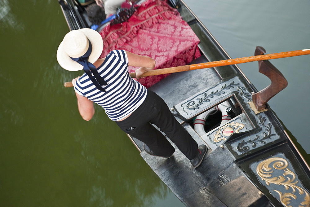 Gondolier on a gondola