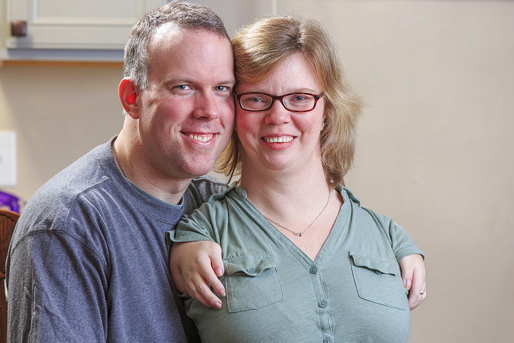 Portrait of a woman with TAR Syndrome and her husband