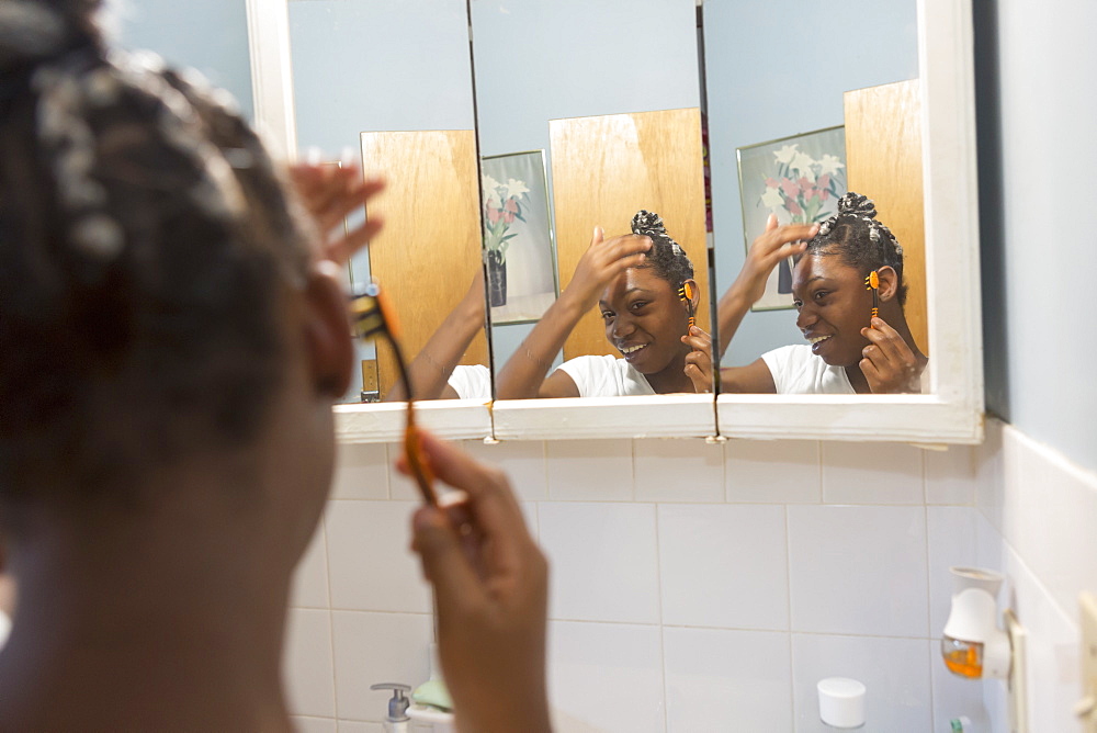 Teen suffering from Bipolar Disorder doing her hair