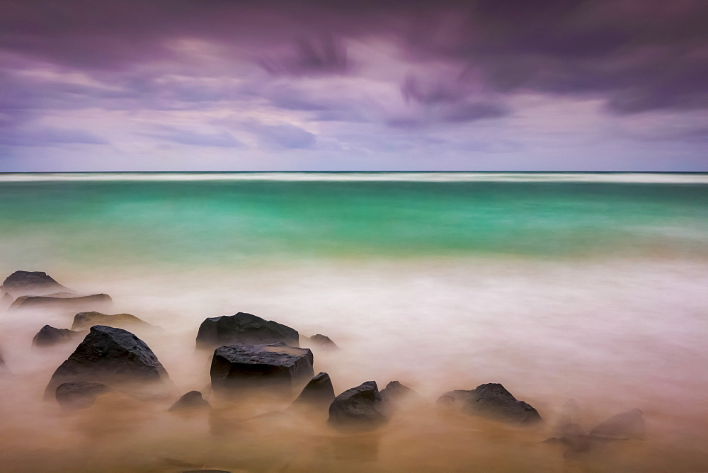 Sunrise over Lydgate beach and ocean; Kapaa, Kauai, Hawaii, United States of America