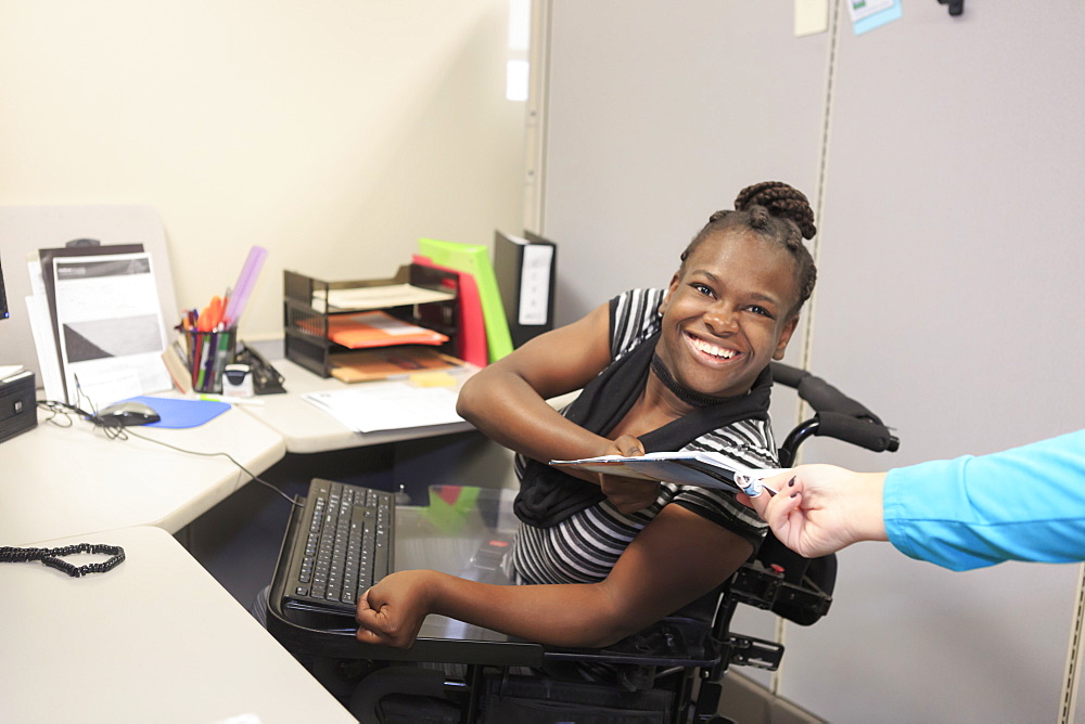 Teen with Cerebral Palsy and Cognitive issues at work