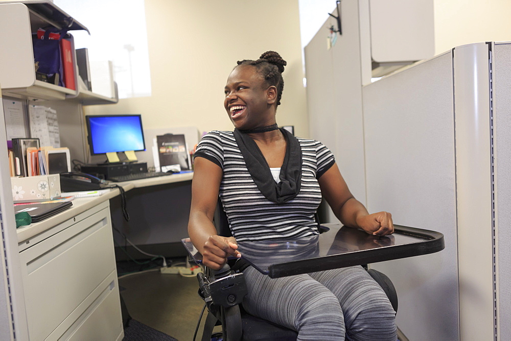 Teen with a Cognitive Disorder working in an office