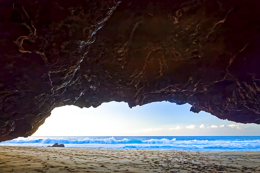 Kalalau Beach, viewed from a cave, Na Pali Coast State Park; Kauai, Hawaii, United States of America