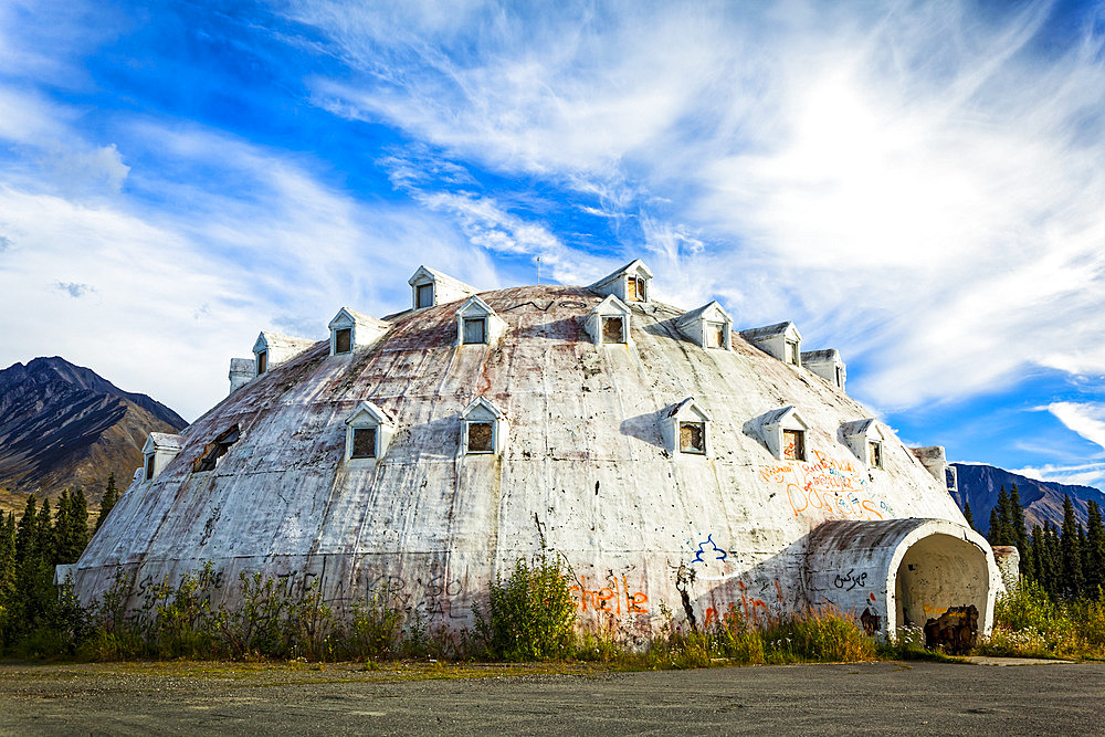 Abandoned Igloo City Hotel, and Igloo-shaped building at Igloo City along the George Parks Highway, Interior Alaska in summertime; Cantwell, Alaska, United States of America