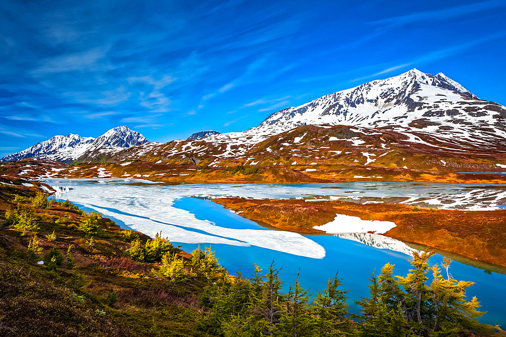 Mount Ascension, Resurrection Peaks, and half frozen Lost Lake, Chugach National Forest, Kenai Peninsula, South-central Alaska in springtime; Seward, Alaska, United States of America