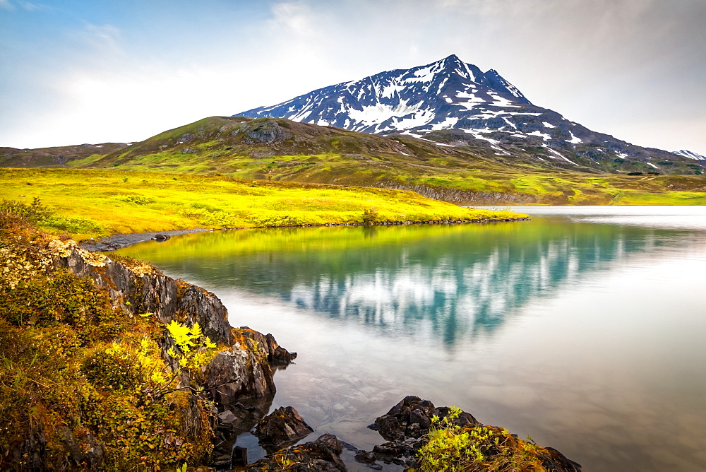 Mount Ascension reflects on Lost Lake, Chugach National Forest, Kenai Peninsula, South-central Alaska in summertime; Seward, Alaska, United States of America