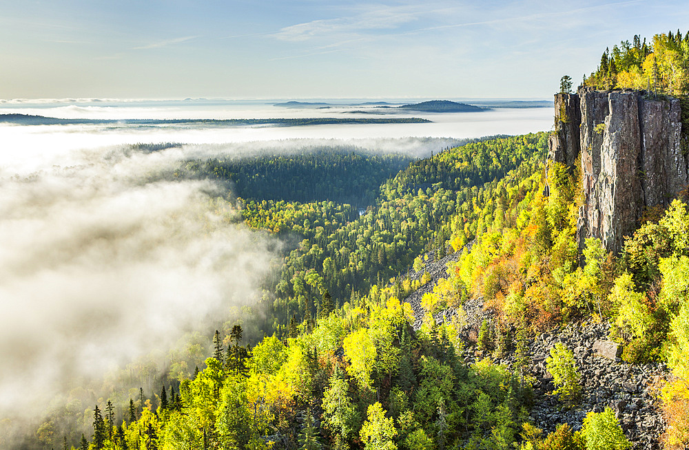 Sunrise over a misty, foggy valley in the Canadian Shield; Dorian, Ontario, Canada