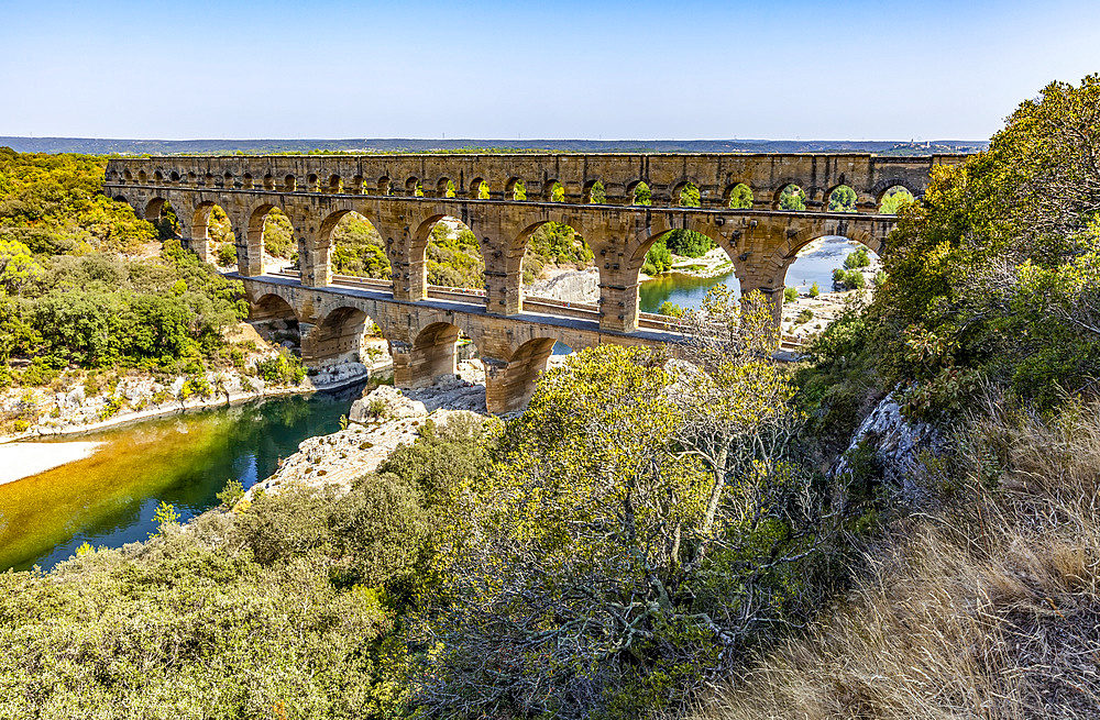 View of the ancient Roman aqueduct bridge, Pont du Gard; Gard, France