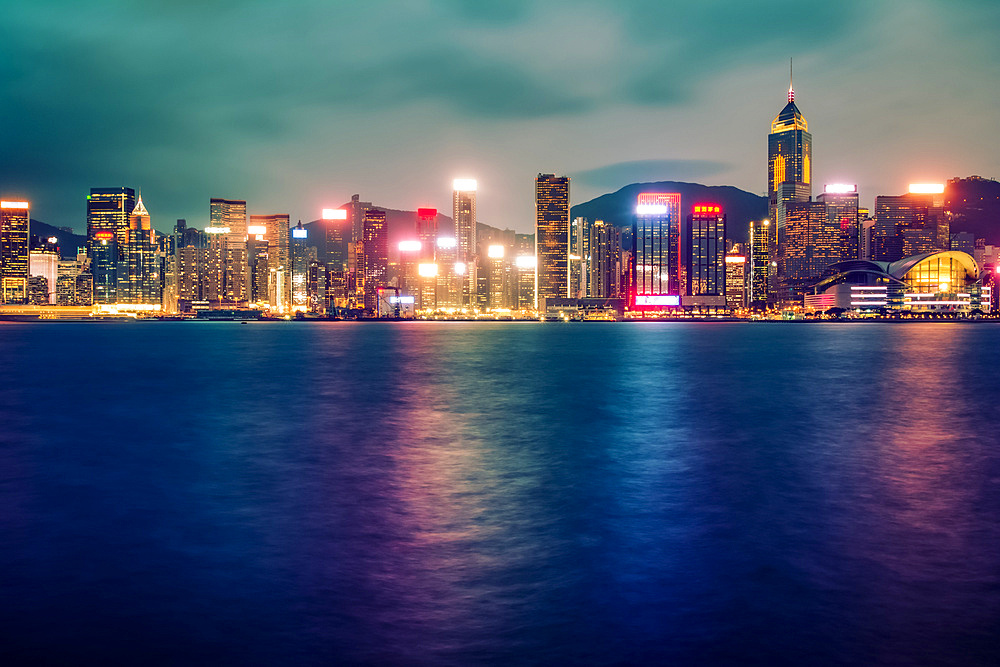 Long exposure at twilight of Hong Kong skyscrapers taken from Tsim Tsa Tsui; Hong Kong, Hong Kong Special Administrative Region (SAR), Hong Kong