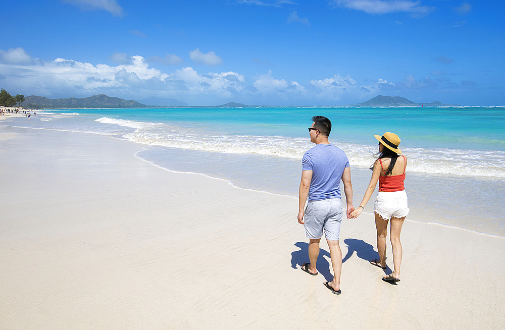 An Asian couple enjoying a vacation at Kailua Beach Park: Kailua, Oahu, Hawaii, United States of America