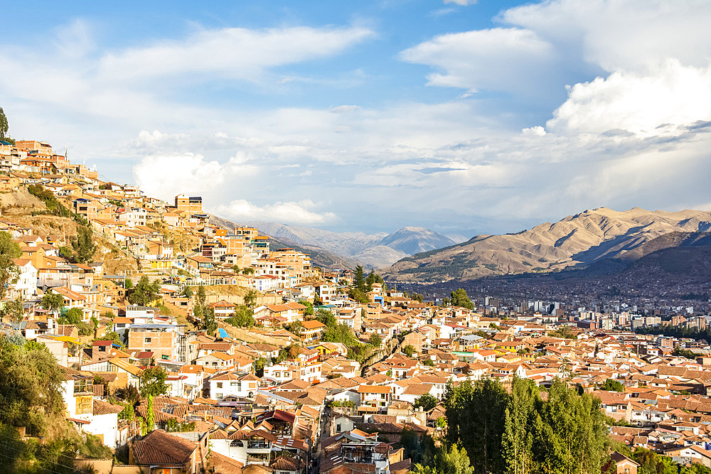 Hills of the city of Cusco, Peru in warm late afternoon light; Cusco, Cusco, Peru