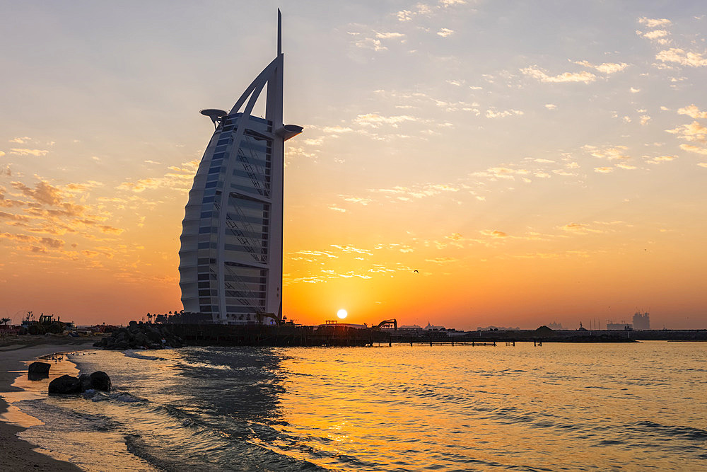 Sunset behind Burj Al Arab; Dubai, United Arab Emirates