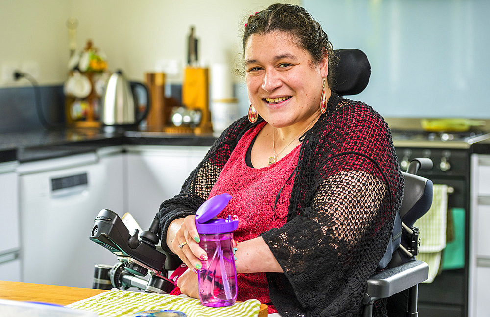 Maori woman with Cerebral Palsy in a wheelchair; Wellington, New Zealand