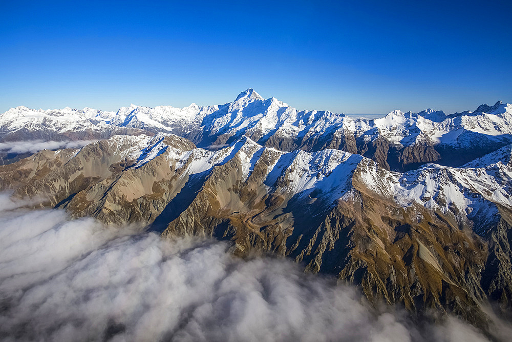 A helicopter tour provides stunning views over the Mount Cook glacier and surrounding mountaintops, Mount Cook National Park; Canterbury, New Zealand