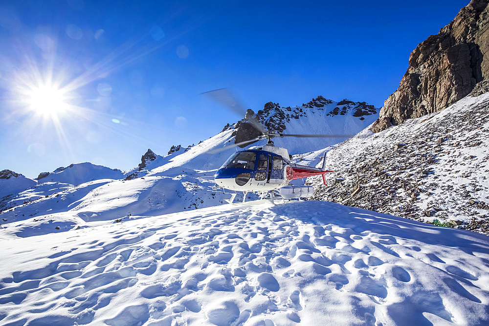 A helicopter tour provides stunning views over the Mount Cook glacier and surrounding mountaintops, Mount Cook National Park; Canterbury, New Zealand