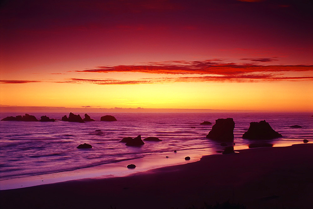 Sunset over Beach, Surf and Rock Formations, Bandon Beach, Oregon Coast, Oregon, USA