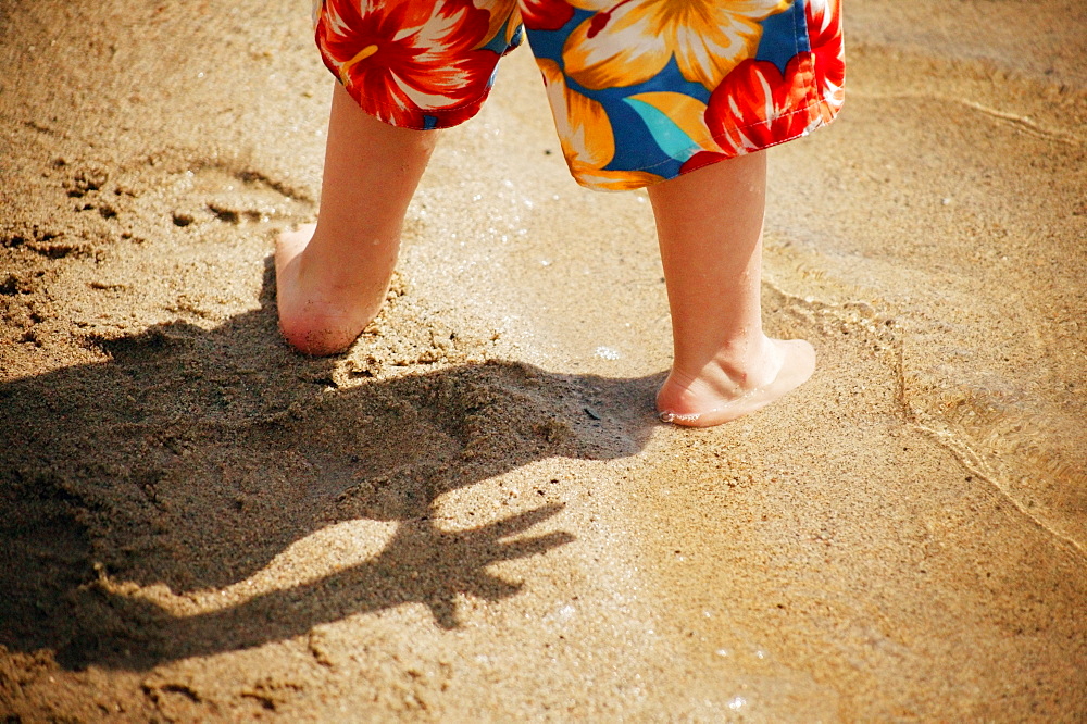 Toddler Feet In Sand At Beach