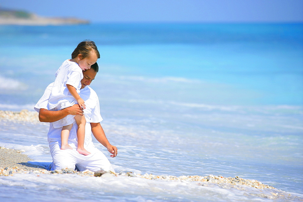 Father And Child On The Beach