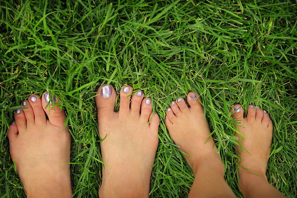 Mother And Daughter With Painted Toenails