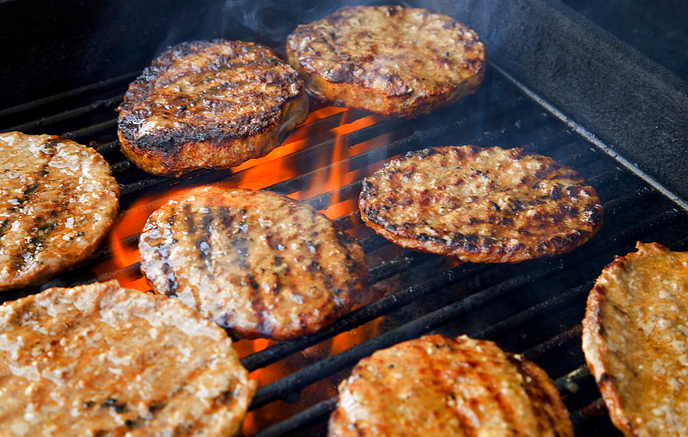 Hamburger Patties Cooking On The Grill