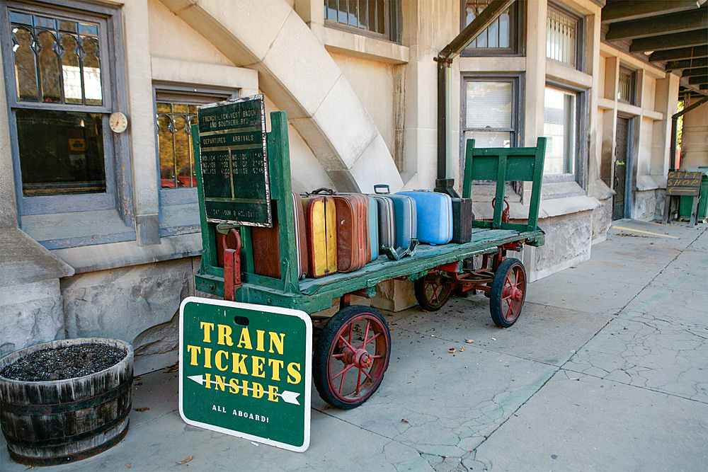 Cart loaded with suitcases at a train station, French Lick, Indiana, United States of America