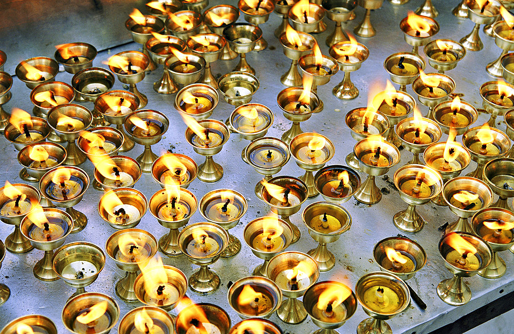 Prayer candles at the Swayambhunath Temple in Kathmandu, Kathmandu, Nepal