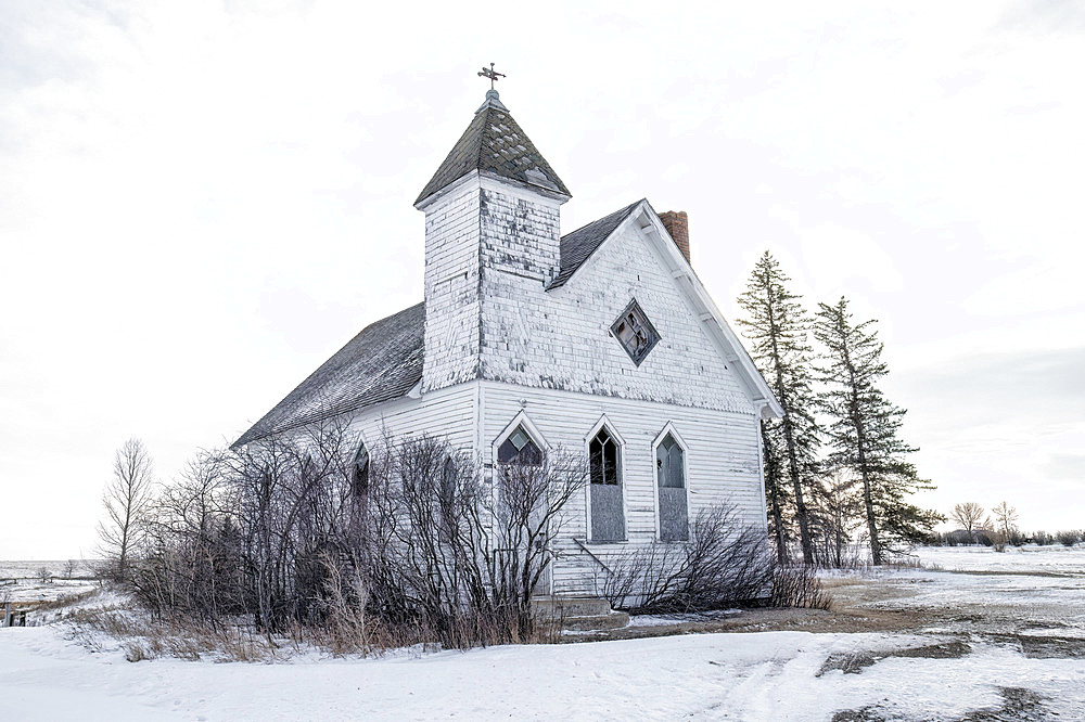 Abandoned Christ Lutheran Church in rural Saskatchewan in winter, Trossachs, Saskatchewan, Canada