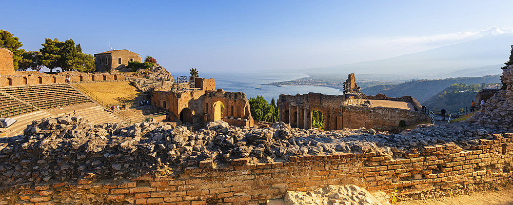 Ruins of a Greek theatre and view of the coastline in Taormina, Sicily, Italy, Taormina, Sicily, Italy