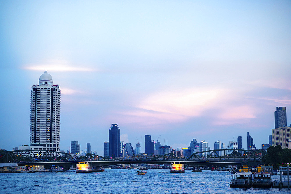 View of Bangkok at dusk along the Chao Phraya River in Thailand, Bangkok, Bangkok, Thailand