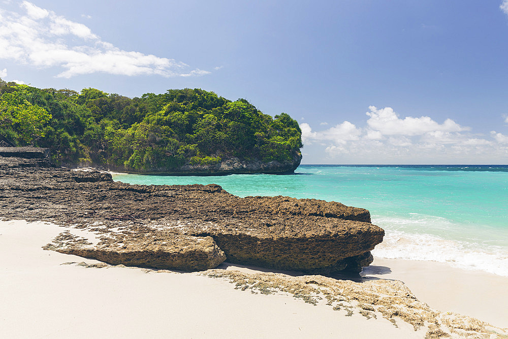 Pristine turquoise ocean water and white sand beach on an island in the Indian Ocean, Southeast Asia, Patiala Bawa, Lamboya, West Sumba Regency, East Nusa Tenggara, Indonesia