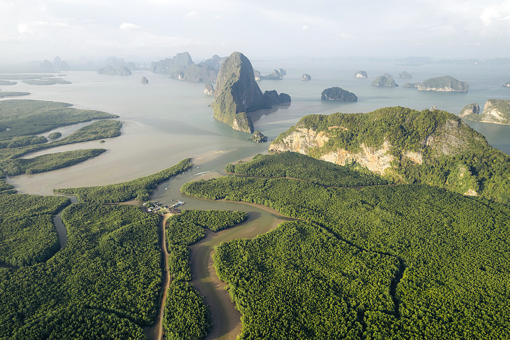 Karst rock formations in Ao Phang Nga National Park, with fog over the Southern Thailand landscape, Ao Phang Nga, Phang-nga, Thailand