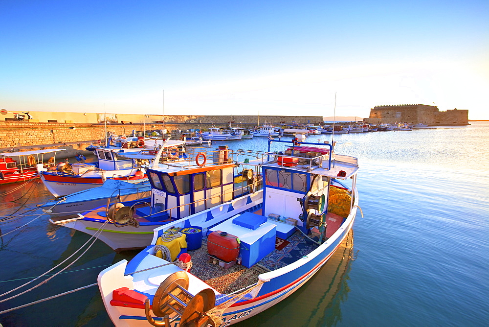 The boat lined Venetian Harbour and Fortress, Heraklion, Crete, Greek Islands, Greece, Europe