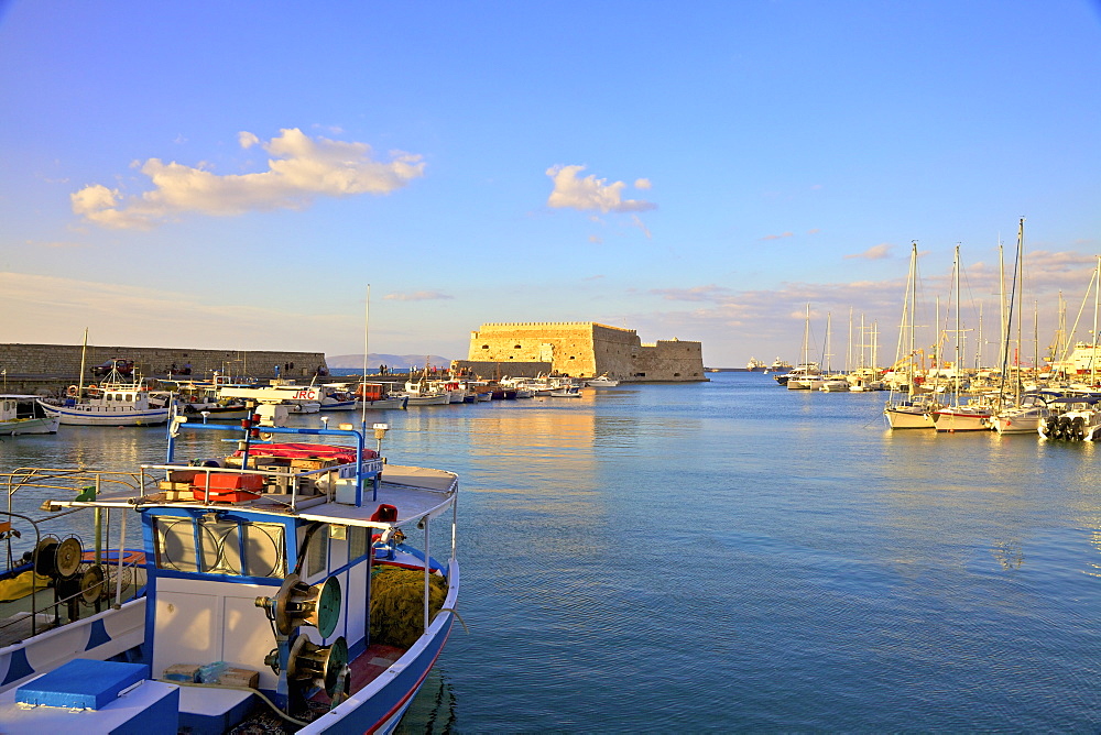 The boat lined Venetian Harbour and Fortress, Heraklion, Crete, Greek Islands, Greece, Europe