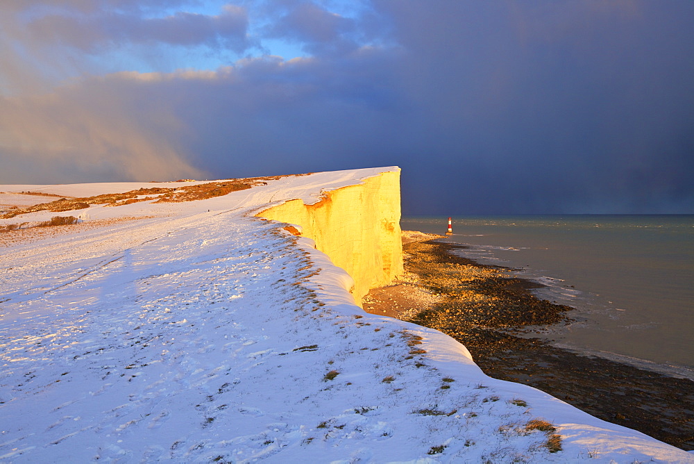 Snow covered Beachy Head and Lighthouse, Eastbourne Downland Estate, Eastbourne, East Sussex, England, United Kingdom, Europe