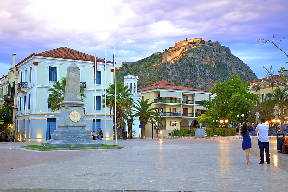 Filelinon Square and Palamidi Fortress at Dusk, Old Town of Nafplio, Argolis, The Peloponnese, Greece, Europe