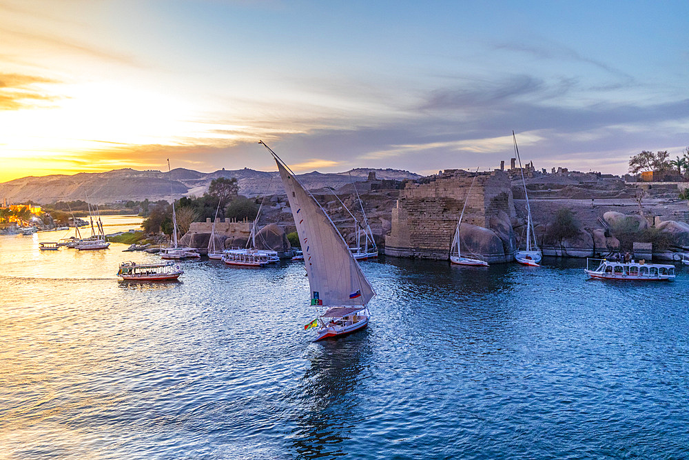 Feluccas on The River Nile at sunset, Aswan, Egypt, North Africa, Africa