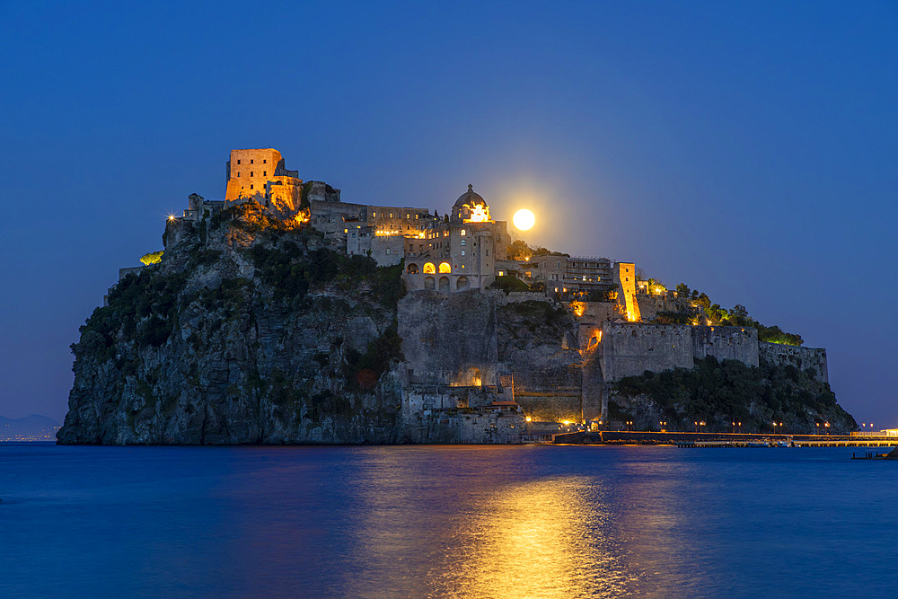 Castello Aragonese at dusk, Island of Ischia, Campania, Italy, Europe