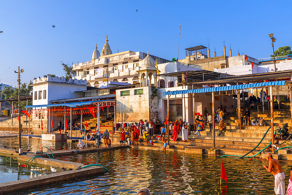 Pilgrims at Pushkar Lake at sunrise, Pushkar, Rajasthan, India, South Asia, Asia