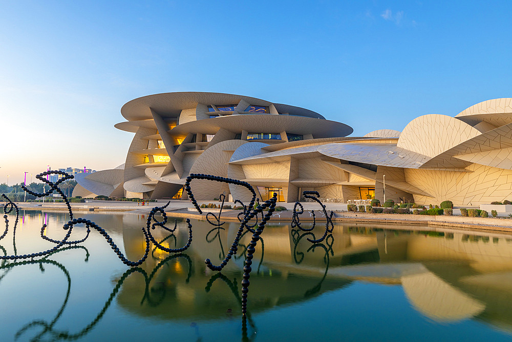 National Museum of Qatar at dusk, Doha, Qatar, Middle East,