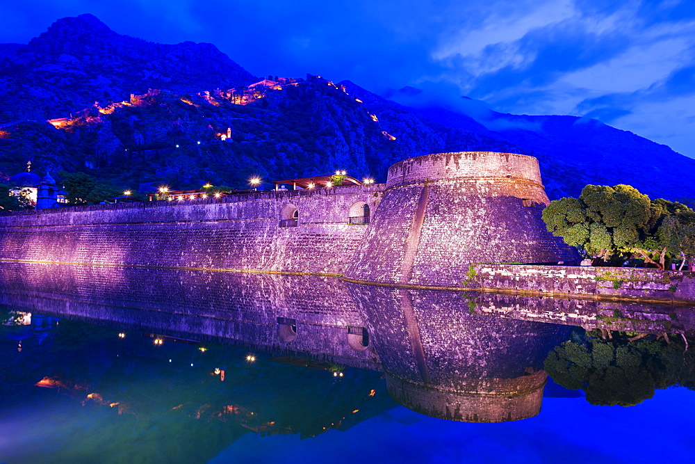 City ramparts at night in Kotor, Montenegro, Europe