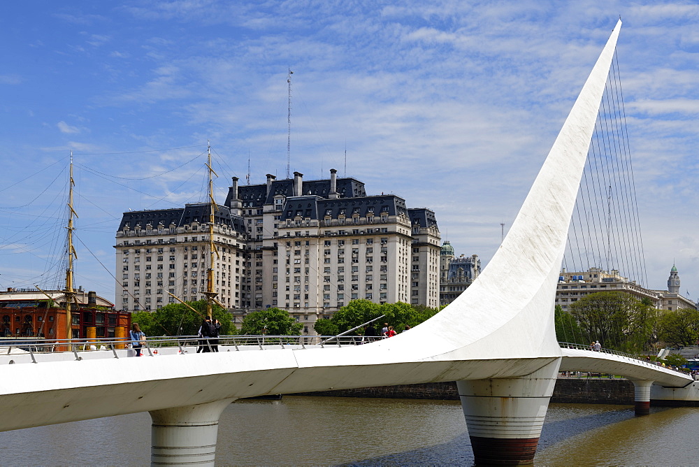 Women's rotating bridge, Puente de la Mujer, Ministry of Defence (Libertador) Building behind, Buenos Aires, Argentina, South America