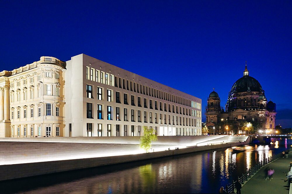 The Berlin Palace (Humboldt Forum) along the Spree Rriver, and Berliner Dom illuminated at night, Unter den Linden, Berlin, Germany, Europe