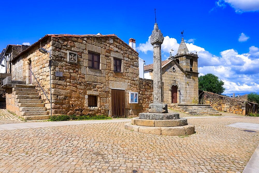 Stone pillory and Main Church, Idanha-a-Velha village, Serra da Estrela, Beira Alta, Portugal, Europe