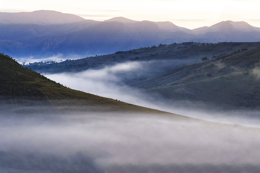 Early morning fog over valleys and mountains, Serra da Canastra, Minas Gerais state, Brazil, South America