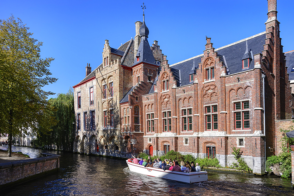 Tourist boats on the Dijver canal, Bruges, Flanders, Belgium, Europe