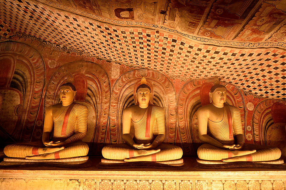 Buddha statues and murals in Dambulla Cave Temple, Dambulla, Sri Lanka