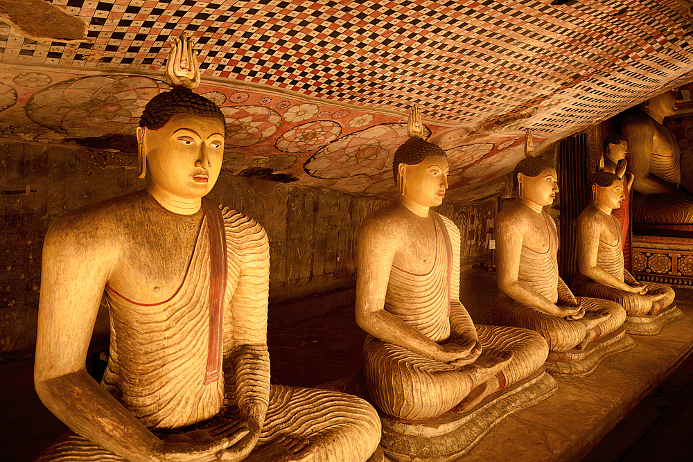 Buddha statues and murals in Dambulla Cave Temple, Dambulla, Sri Lanka