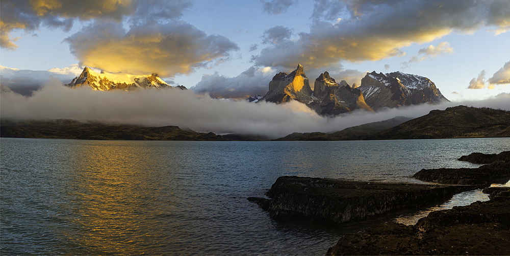 Sunrise over Cuernos del Paine, Torres del Paine National Park and Lago Pehoe, Chilean Patagonia, Chile, South America