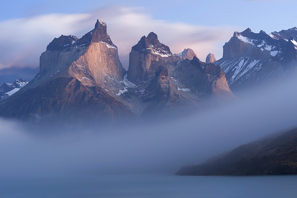 Sunrise over Cuernos del Paine and Lago Pehoe, Torres del Paine National Park, Chilean Patagonia, Chile, South America